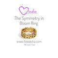 The Symmetry in Bloom Ring